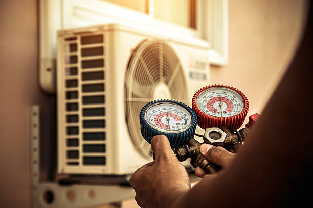 Professional Hvac technician working in Oroville, WA